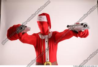 34 2019 01 JOEL ADAMSON CHRISTMAS VILLAIN WITH TWO GUNS